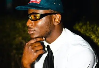 Man in White Dress Shirt and Blue and White Fitted Cap